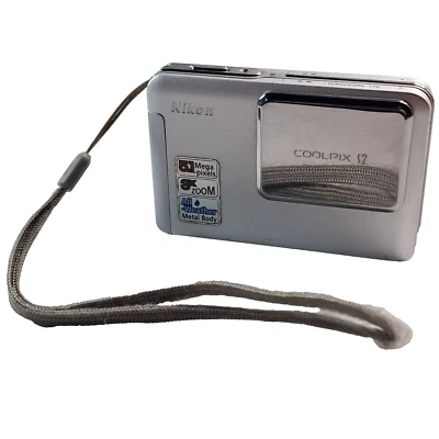 Nikon Coolpix S2 5.1 MP 3X Zoom Digital Camera Silver All Weather - Semi Tested - Image 1 of 4