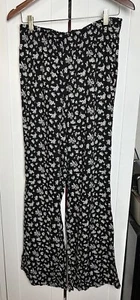 Divided H&M Damen schwarz Blumen ausgestelltes Bein Boho Hose Gr. 12 - Bild 1 von 8
