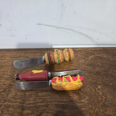 Boston Warehouse Esparcidor de Mantequilla Queso Comida Hamburguesa Cuchillo Hot Dog Ketchup Foto 1 de 4