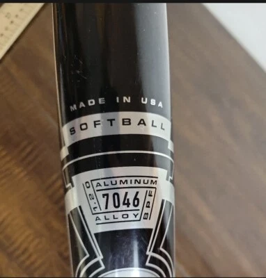 Bate de béisbol oficial juvenil Nike negro aleación 7046 9 OZ talla 28 19 Foto 1 de 4