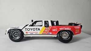 Camión trofeo Toyota TRD #1 T100 Ivan Stewart, por AUTOart, escala 1/18 Baja LEER - Imagen 1 de 13