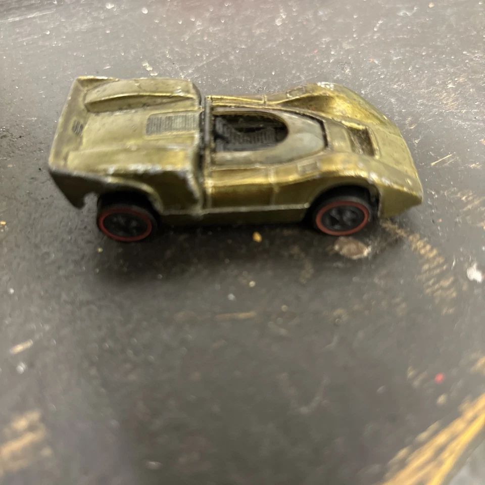 Hot Wheels 1968 Redline Mclaren M6A dorado Foto 1 de 4