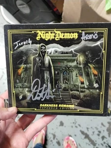SIGNED 2-CD Night Demon Darkness Remains  NO BOOKLET .. ripped CORNER - Bild 1 von 3