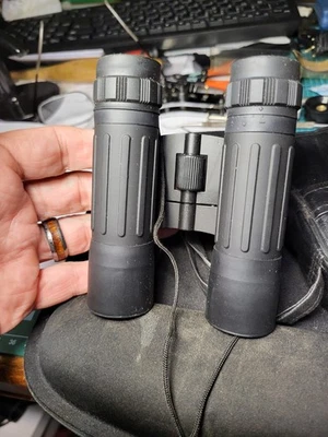 Tecno 10x25DCF Compact Binoculars with Case and Strap - Image 1 of 4