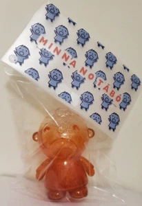 Unbox Industries x Sanrio Minna No Tabo Vinyl Figure Transparent Orange Ver - Picture 1 of 2