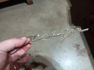 1957 Chevy Bel Air Gold Script Bel Air Dash Emblem - Picture 1 of 2
