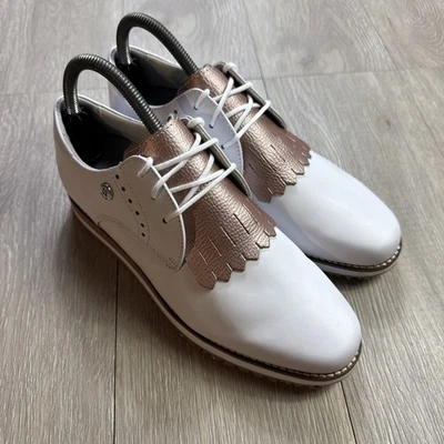 Sapatos de golfe femininos FOOTJOY FJ 7 M branco ouro rosa borla kiltie sem cravos novo - Imagem 1 de 4