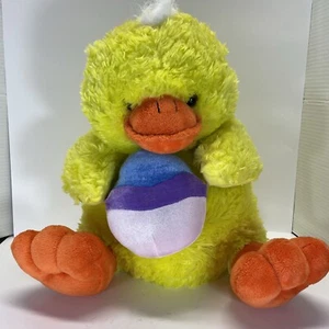 Peluche Pato de Pascua Amarillo Brillante, Pies Naranja Sosteniendo Huevo. Usado - Imagen 1 de 5