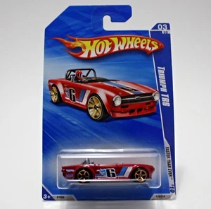 Hot Wheels Red Triumph TR6 2010 Faster Than Ever R7556 129/214 03/10 NEW IN BOX - Picture 1 of 4