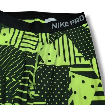 Женские леггинсы Nike Pro Capri с узором Green Dot спортивные штаны *носятся один раз - Изображение 1 из 4
