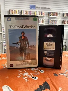 The Road Warrior 1982 VHS Warner Home Video Mel Gibson Clam Shell mad max - Picture 1 of 2