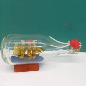 VINTAGE MINIATURE GLASS SHIP IN A BOTTLE 5''L WITH TURKISH FLAG AND CORK - Picture 1 of 4