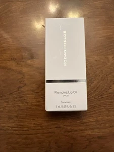 Rodan + Fields Plumping Lip Oil SPF 28 New in Box "Coral" Exp. 1/2026 - Picture 1 of 4