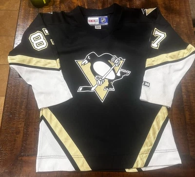 Camiseta deportiva de hockey para jóvenes/niños Pittsburgh Penguins NHL SIdney Crosby CCM Foto 1 de 4