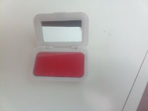 blusher cream and soft in pink with a mirror compact white box