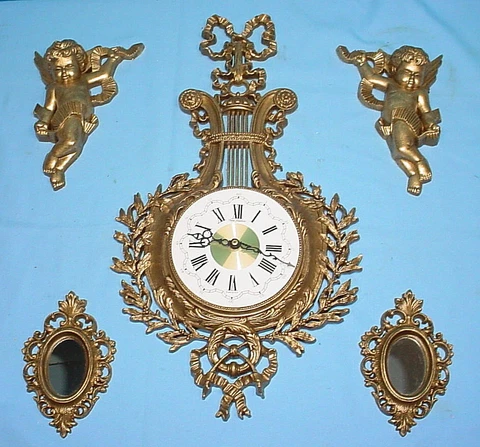 New Haven Burwood Clock Mirror Cherub Angel Wall Decor Set Hollywood Regency Cover