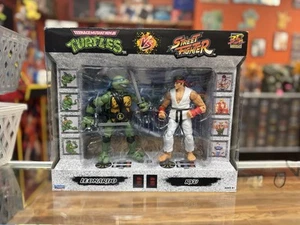 2022 Street Fighter II vs Ninja Turtles Figure 2-Pack - LEONARDO VS. RYU - Picture 1 of 10