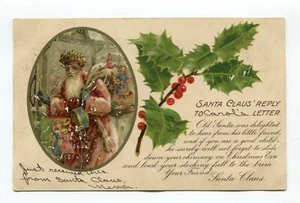 POSTAL De Colección En relieve Antigua Edad SANTA en Abrigo Rosa y Sombrero de Acebo 1909 - Imagen 1 de 2