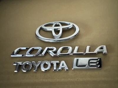 FREE SHIP! OEM 2003-2008 04 05 06 07 08 TOYOTA COROLLA LE REAR BADGE EMBLEM Set - Imagem 1 de 4