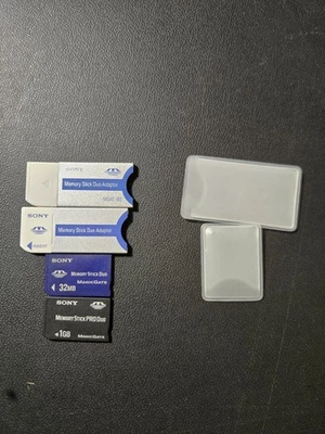 2 Sony Magic Gate Memory Stick Duo's 1 GB & 32MB  & 2 Memory Stick Duo Adapter's - Image 1 of 2