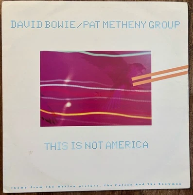 DAVID BOWIE / PAT METHENY GROUP - THIS IS NOT AMERICA  EX-/EX+ 12" VINYL /POSTER - Image 1 of 4