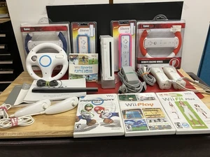 Pacchetto console Wii, più 4 giochi - Foto 1 di 9