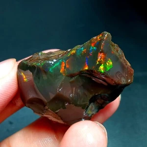 Piedra preciosa de fuego áspera ópalo negro Welo etíope natural 82 quilates 36x22x18 mm - Imagen 1 de 8