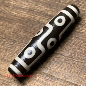 Colgante amuleto de cuentas Dzi antiguo de 13 x 58 mm con recubrimiento de aceite alto de ágata antigua de nueve ojos - Imagen 1 de 5