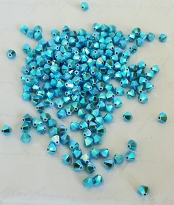 Swarovski Crystal 5328 4mm bicone beads, Turquoise AB2X (24pcs) - Picture 1 of 4