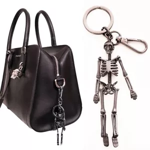 NEW $375 ALEXANDER MCQUEEN Gunmetal Silver Tone Brass DANCING SKELETON KEYRING - Picture 1 of 12