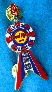 COLOGNE 4th JULY ROSETTE BUNTING FLYING V GUITAR 2006 Hard Rock Cafe PIN LE - Picture 1 of 1