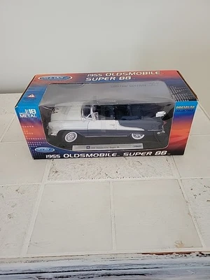 Oldsmobile Super 88 1955 Welly edición limitada convertible azul y blanco... Foto 1 de 4