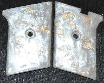 Phoenix Arms Raven 25 ACP pistol grips flip safety pearl with gold leaf plastic