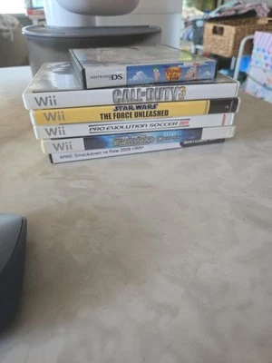Nintendo Wii And Ds Game Lot Of 6( call of duty, star wars WWE Phineas and ferb) - Image 1 of 4