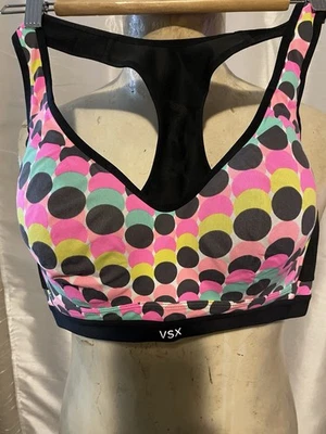 Sujetador deportivo Victoria’s Secret VSX con patrón de lunares multicolor | Talla 34DD Foto 1 de 4