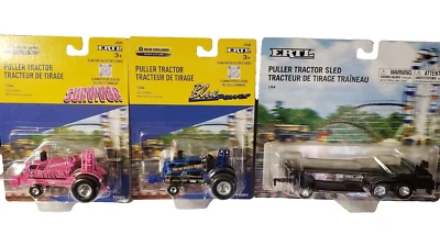 ERTL 1:64  NEW HOLLAND PULLING TRACTORS SURVIVOR & BLUE POWER Pullers PLUS SLED - Image 1 of 4