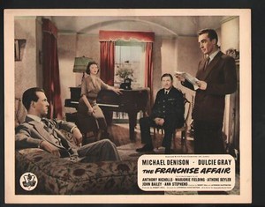 Franchise Affair Lobby Card-Michael Denison reading