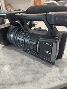 Sony Handycam HDR-AX2000 AVCHD High-Resolution Camcorder with Accessories - Picture 1 of 12