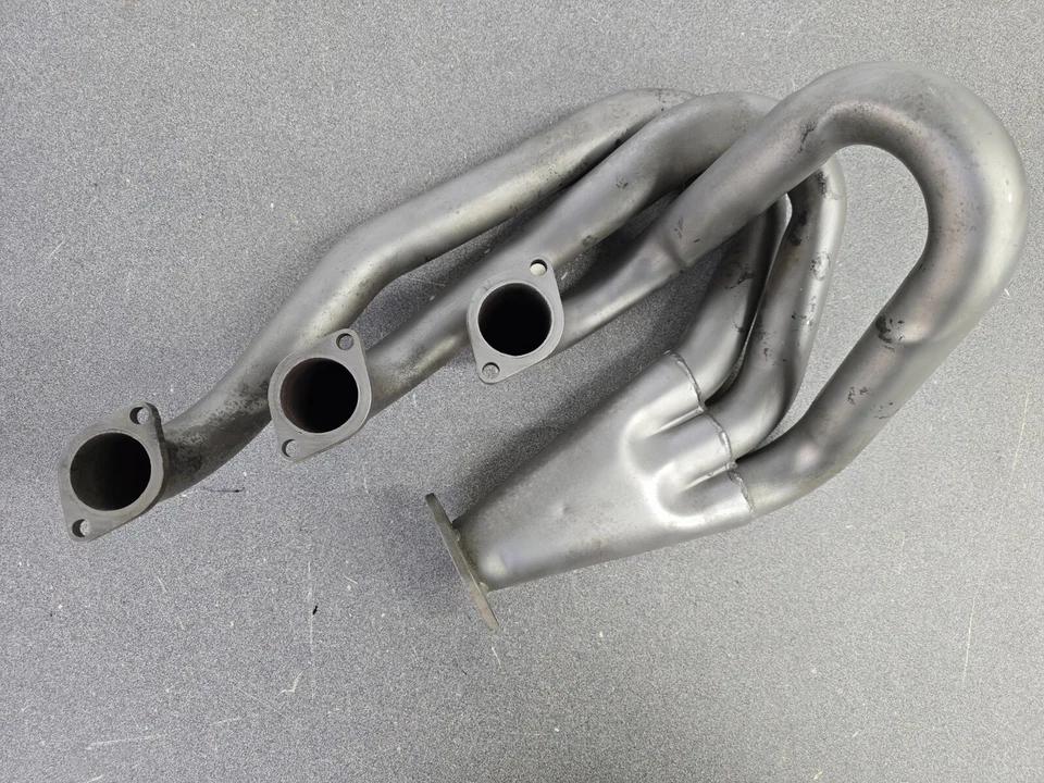 BONITO CABEZAL DE ESCAPE LATERAL PARA PASAJEROS PORSCHE 911 TODOTERRENO #2 USADO Foto 1 de 4