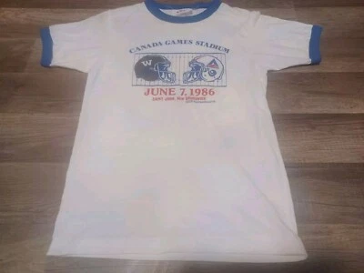 Camiseta De Colección Años 80 1986 CFL Montreal Alouettes Vs Winnipeg Bombers Pequeña 15x23 Foto 1 de 4