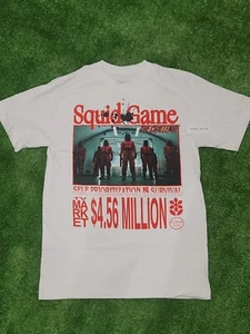 Camiseta PacSun Market Netflix Juego de Calamares Blanca Hombre Programa de TV Camiseta - Imagen 1 de 4