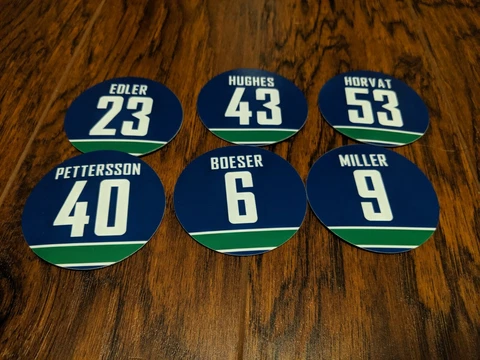 Vancouver Canucks Jersey Magnets - Horvat,  Pettersson, Boeser, Quinn Hughes Cover