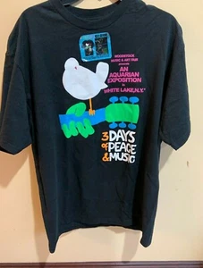 2011 WOODSTOCK VENTURES MUSIC & ART FAIR GRAPHIC T SHIRT COLOR GLOW - Imagen 1 de 4