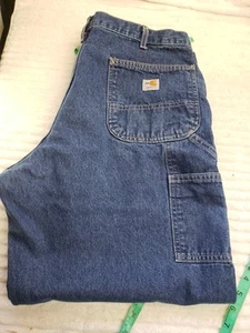 Pantalones de mezclilla Carhartt para hombre FR resistentes al fuego azul talla 38x30 OSHA29 CFR 1910 - Imagen 1 de 11