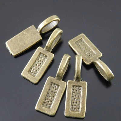 120PCS Bronze Tone Antique Rectangle Glue on Bail Jewelry Finiding 12*7mm 36610 Foto 1 de 4