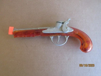 Pistola de juguete Hubley Flintlock Jr. de colección de los años 60 de metal fundido con mango de plástico remolinado Foto 1 de 4