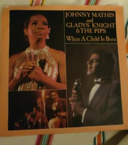 JOHNNY MATHIS AND GLADYS KNIGHT AND THE PIPS WHEN A CHILD IS BORN : Mint 1980 7" - Picture 1 of 4