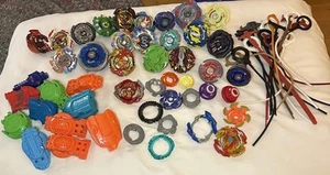 Gran Lote de Beyblades: Piezas de Metal Discos Lanzadores Rip Cords Mezcla Surtida  - Imagen 1 de 4