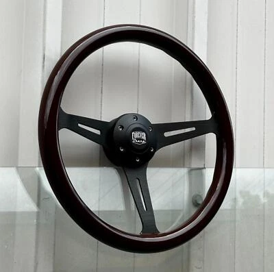 Volante negro de 15" (380 mm) con empuñadura de madera oscura y botón de bocina - 6 orificios Foto 1 de 4