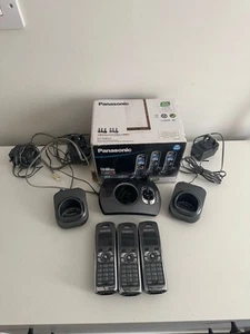 Panasonic KX-TG8323 trzy potrójne bezprzewodowe telefony domowe z ładowarkami - Zdjęcie 1 z 8